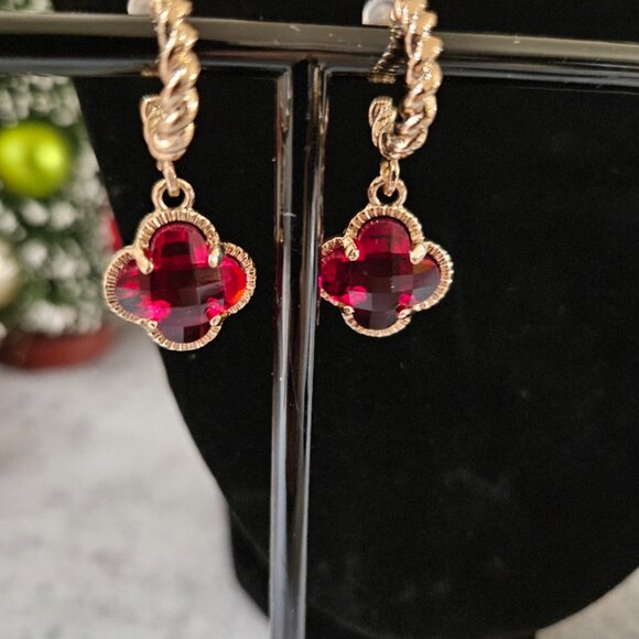 Gold Tone Huggie Hoop Earrings with Dangling Red Clover Shaped Pendant - Picture 2 of 2